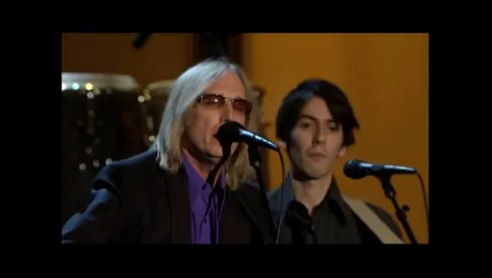 Prince, Tom Petty, Steve Winwood, Dhani Harrison, Jeff Lynne and others 2004 “While My Guitar Gently Weeps“