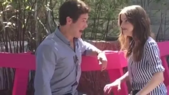 Adam Devine and Anna Kendrick staring contest at SXSW Mashable House