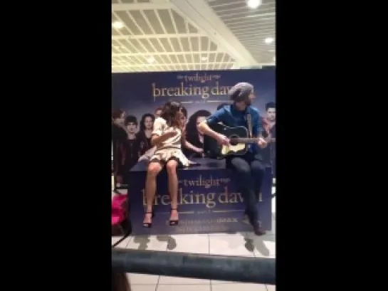 Nikki Reed & Paul McDonald singing at a Glasgow signing