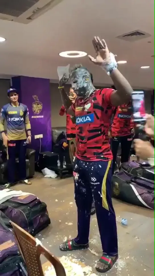 SRK with the KKR squad in the dressing room for the birthday celebrations of Andre Russell. - HappyBirthdayAndreRussell ️