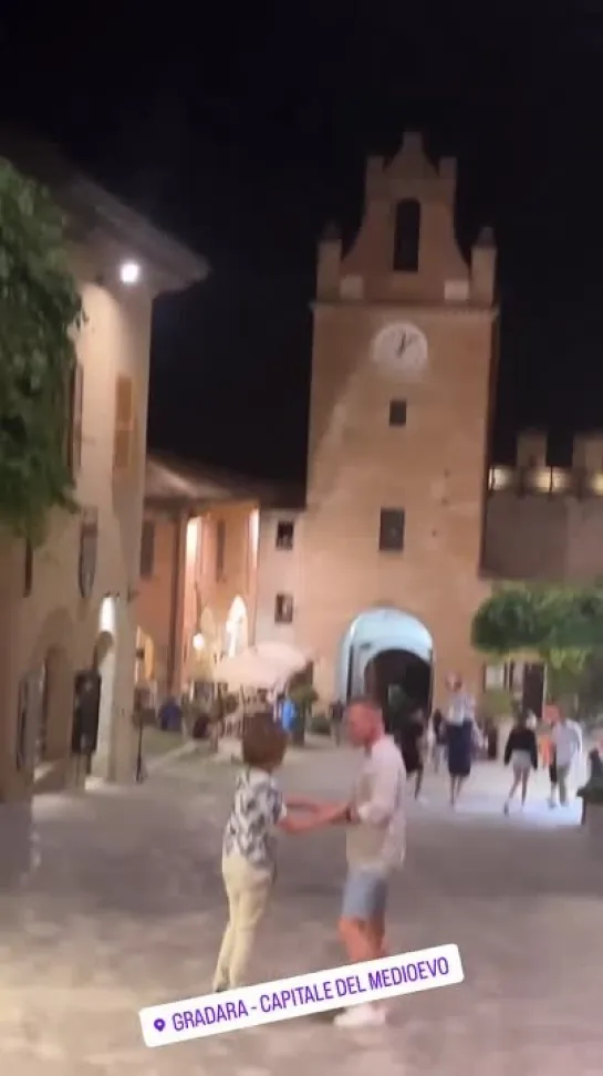 Family night walking in Italy