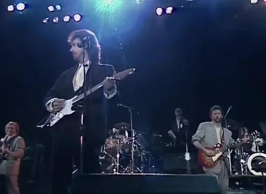 George Harrison. Ringo Starr. Eric Clapton, Elton John  - While My Guitar Gently Weeps (1987)