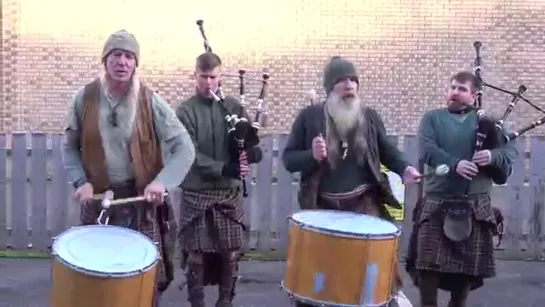 Scottish tribal pipes  drums band Clanadonia playing Ya Bassa during St Andrew