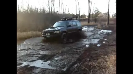 Ford Explorer in the mud (TSL super swampers).