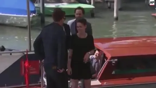 Kristen and Nicholas arriving at Venice Film Festival (05/09)