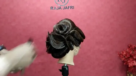 Low bun with roses advance 2019 hairstyle