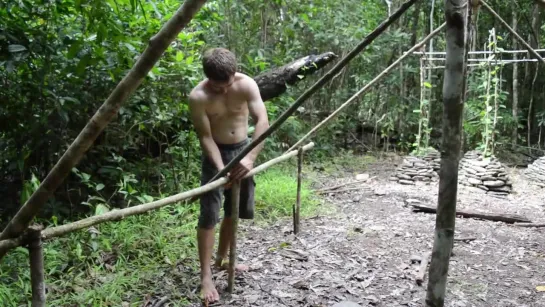 Primitive Technology.  Grass thatch, Mud hut