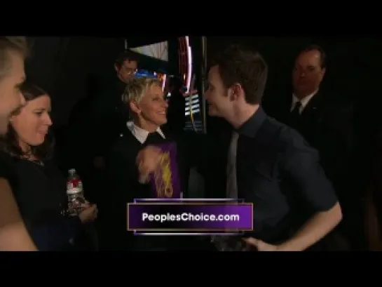 Ellen hugging Chris in PCA backstage