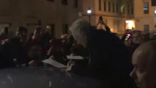 Glenn Close signs autographs for fans on the roof of a car in London after a performance of Sunset Boulevard 2016