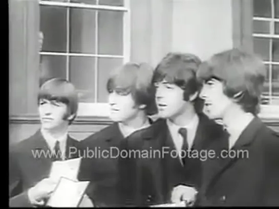 The Beatles Receive MBEs archival stock footage