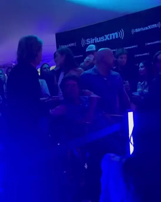 Paul McCartney dancing with Michael J. Fox At Ed Sheeran Concert