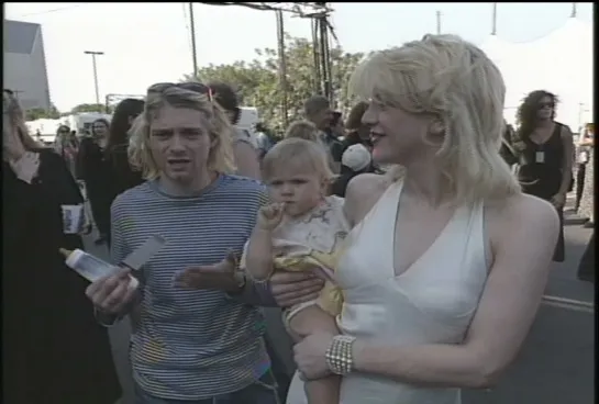 Kurt Cobain, Courtney Love and their daughter Frances Bean Cobain backstage at the 1993 MTV Video Music Awards.