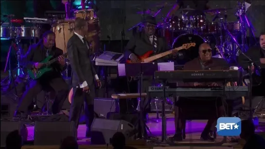 Stevie Wonder with Friend Celebrating - A Message Of Peace Concert 2012