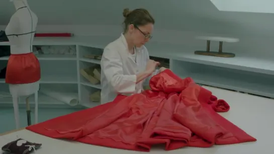 THE HOUSE OF DIOR AT NGV making Red Bar Coat in Dior Atelier