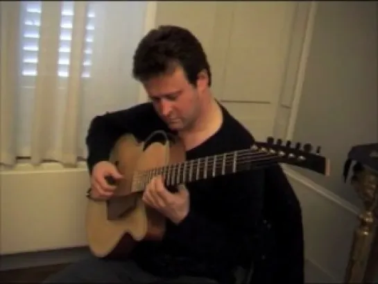 Sylvain Luc checks out the Acoustic Archtop made by Ken Parker