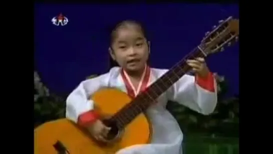 Little North Korean Girl Playing Guitar