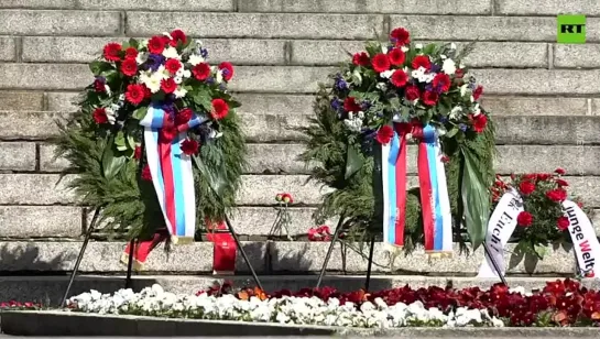 RUSSIAN DELEGATION MARKS VICTORY DAY AT SOVIET WAR MEMORIAL IN BERLIN.