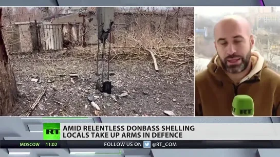 LOCALS TAKE UP ARMS AMID RELENTLESS DONBASS SHELLING.