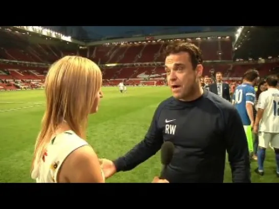 Robbie Williams tears up a Soccer Aid generosity