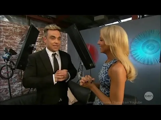 Robbie Williams 'Surprise Kiss' Leaves Aussie Interviewer Tongue tied!