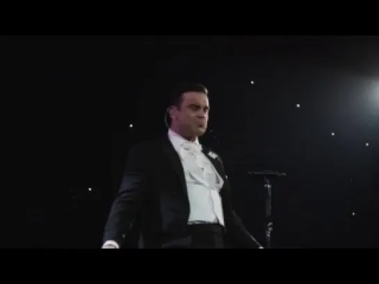 SHOWTIME - ROBBIE WILLIAMS