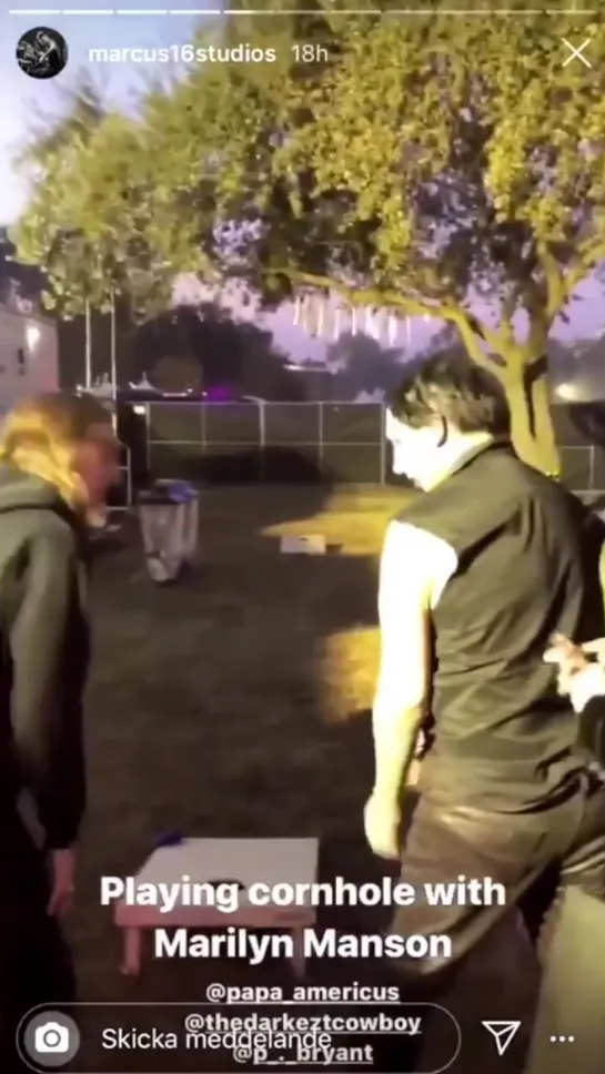 Marilyn Manson is playing cornhole at Aftershock