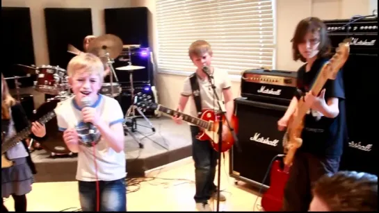 The Mini Band aged 8 to 11 play their new original song Ain