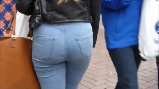 Candid blonde teen with sexy curves in jeans