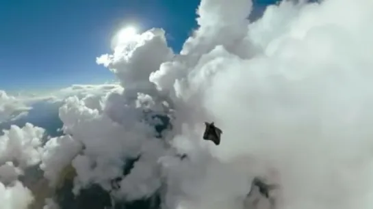 Going skydiving through clouds.