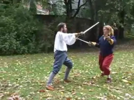 Silver basket-hilted sword demonstration sequences