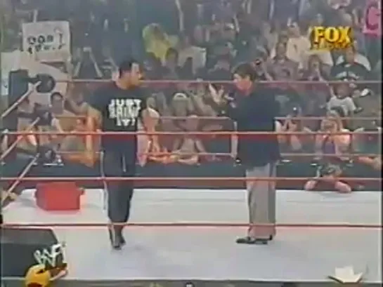 Vince McMahon and The Rock on the ring