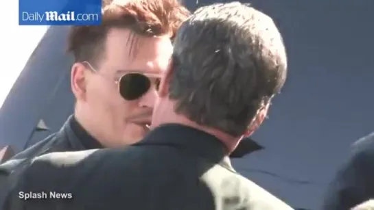 Johnny Depp greets old pals as he arrives at Jimmy Kimmel Live!