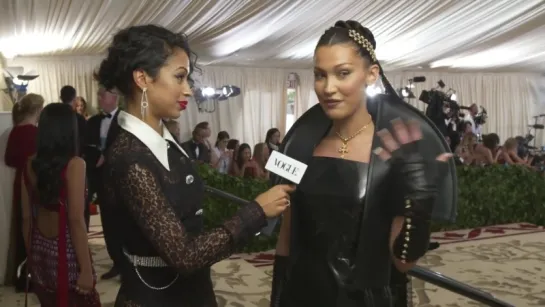 Bella Hadid on Her 10-Pound Sewn-In Veil (Met Gala 2018 With Liza Koshy - Vogue)