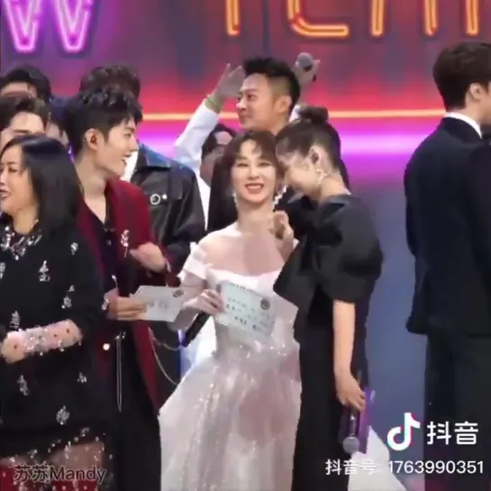 xiao zhan shakes hands