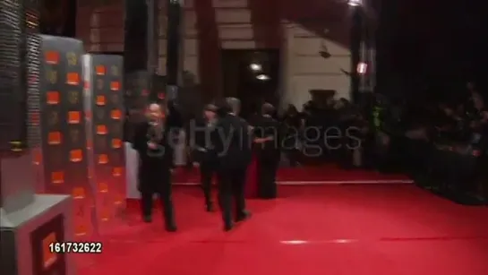 Peter Capaldi posing on red carpet - The Bafta Film Awards (2010)