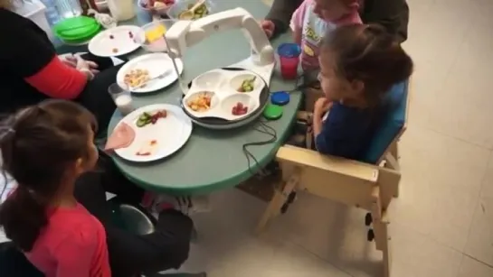 Grace and Obi, her Feeding Robot