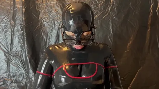 Latex slave gags on huge cock