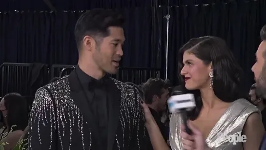 Alexandra Daddario and Ross Butler present the Stunt Ensemble SAG Awards Entertainment Weekly