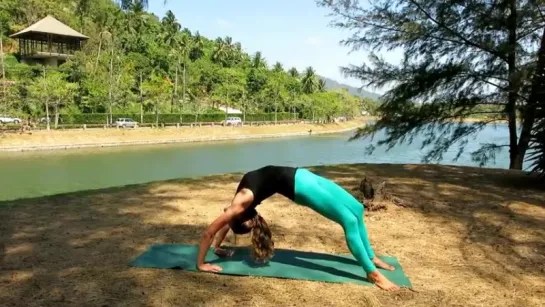 Urdhva dhanurasana ( variation ) Bridge pose with half lotus