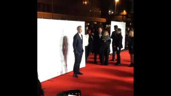 Peter Capaldi walks onto a red carpet