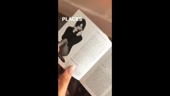 Lea going through a copy of Places (April 23, 2017)