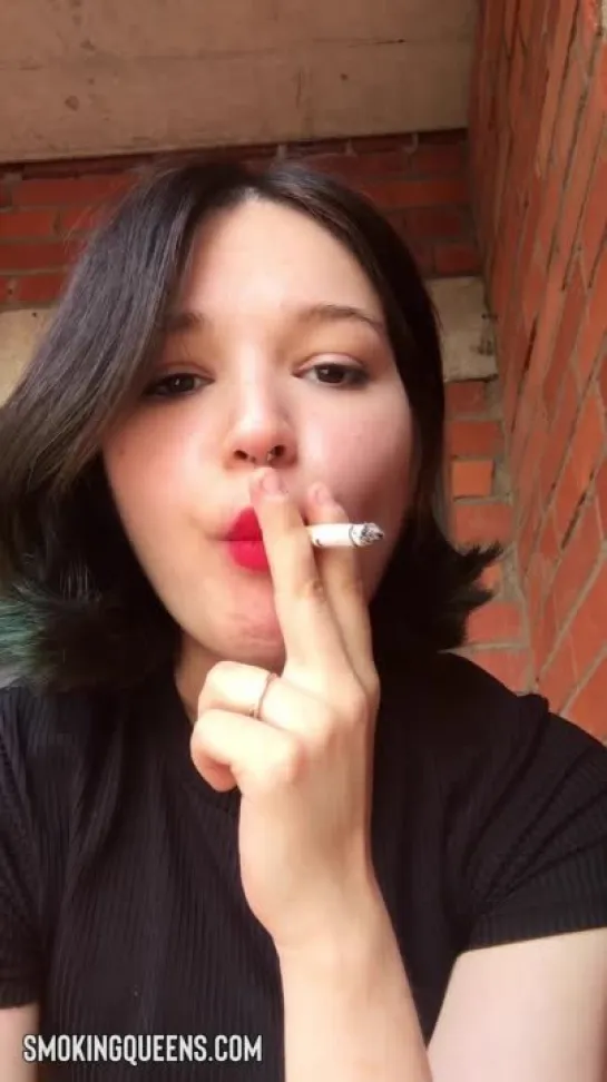 Smoking Fetish Girl is smoking cigarette 35