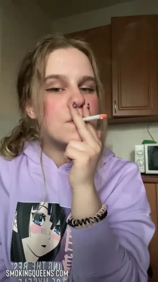 Smoking Fetish Girl is smoking cigarette 34