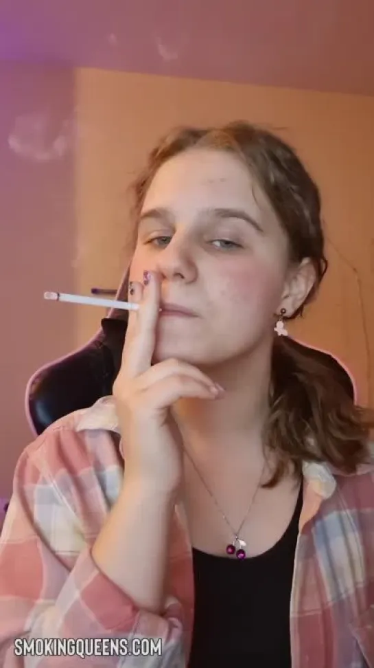 Smoking Fetish Girl is smoking cigarette 25