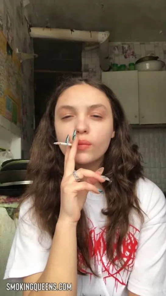 Smoking Fetish Girl is smoking cigarette 18