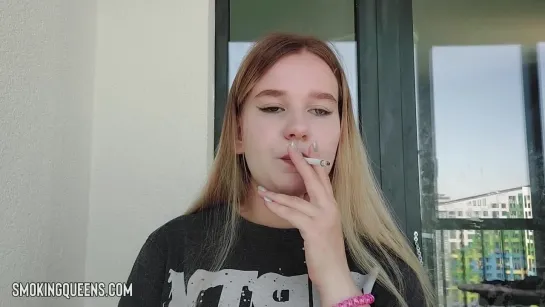 Smoking Fetish Girl is smoking cigarette 11