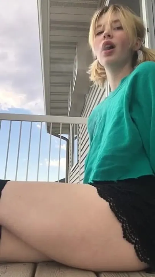 Blonde smokes cig and flashes pussy