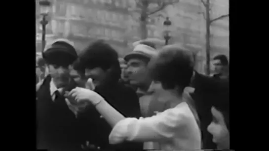 The Beatles stroll thru Paris Champs-Élysées (15.001.1964)