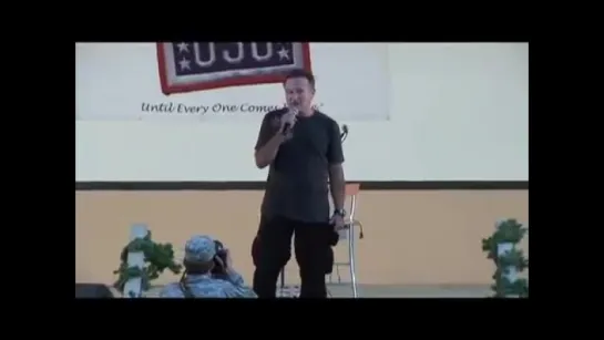 Robin Williams as troops Retreat at Camp Arifjan, Kuwait