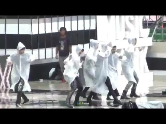 120608 EXO-K rehearsal in raincoats